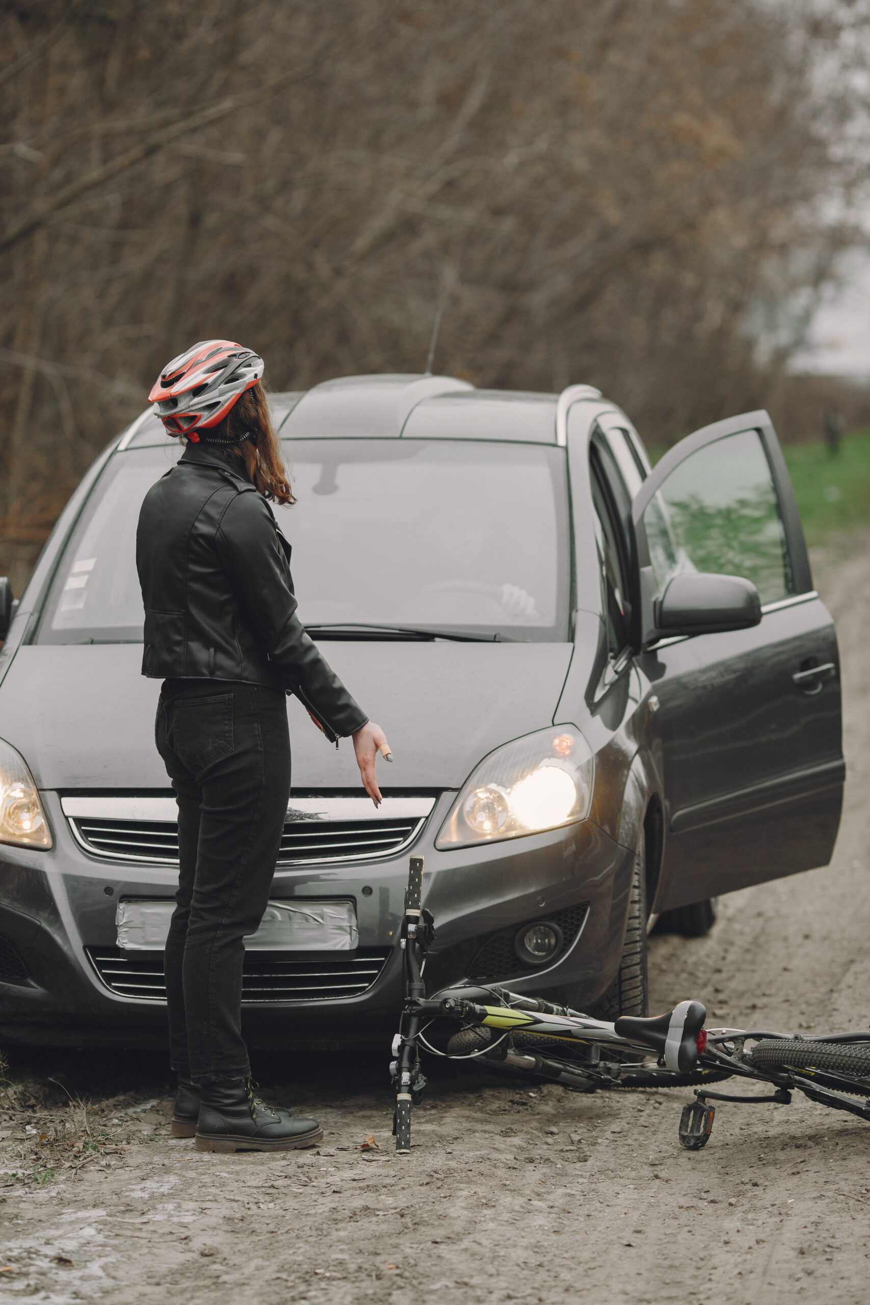 Road accident with cyclist man driver and car
